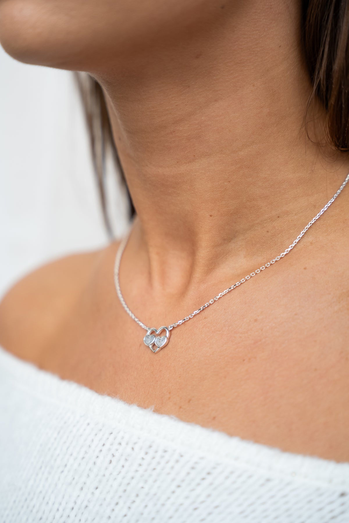 Trinity asketting in zilver, gedragen
